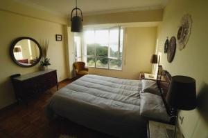 A bed or beds in a room at Primero Seixo antiguo