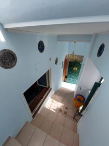 an overhead view of a living room with a fireplace at Casa Muse in Maiori