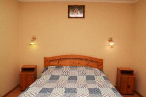 Letto o letti in una camera di Oskolok Dovbusha Mini-Hotel