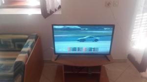 TV a/nebo společenská místnost v ubytování Apartments Martinac
