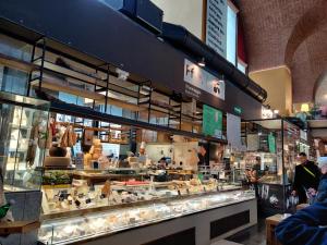 a bakery with a display case in a store at Veniero37 Guest House in Rome +35 photos