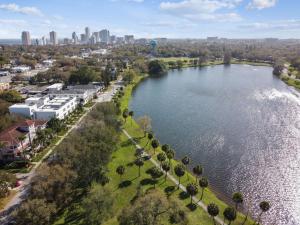 an aerial view of a lake with a city in the background at Lake apt 5 minutes to downtown in St Petersburg