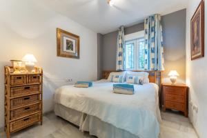 Ένα ή περισσότερα κρεβάτια σε δωμάτιο στο Mi capricho Beachfront Apt +19 φωτογραφίες
