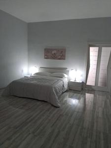 Voodi või voodid majutusasutuse Casa Rosy toas