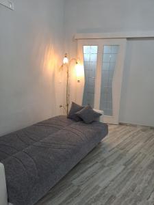 Voodi või voodid majutusasutuse Casa Rosy toas
