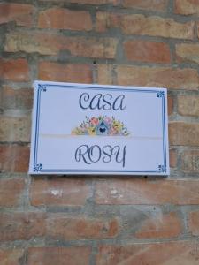 Majutusasutuses Casa Rosy olev sertifikaat, autasu, silt või muu dokument