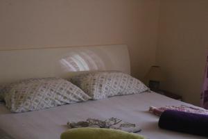 Postel nebo postele na pokoji v ubytování Apartman Zaton