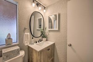 a bathroom with a sink and a mirror at Lake View and Decks Pet-Friendly Mabank Home in Mabank +27 photos