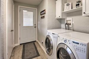 a laundry room with a washer and dryer at Lake View and Decks Pet-Friendly Mabank Home in Mabank