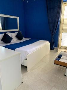 Postel nebo postele na pokoji v ubytování Appartamento Primo Sole