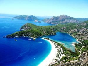 an aerial view of a beach and the ocean at Sundia By Liberty Oludeniz in Oludeniz