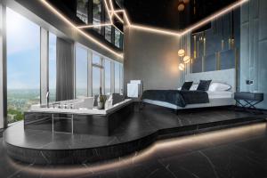 Posteľ alebo postele v izbe v ubytovaní In The Sky - Apartamenty w Sky Tower