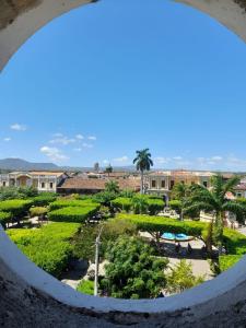 a view of the gardens from the top of a building at Casa Yoly Hostel Granada in Granada