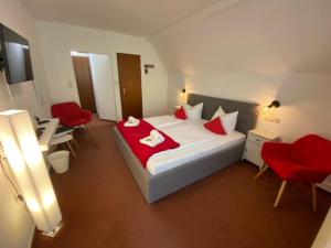 Postel nebo postele na pokoji v ubytování Hotel Rathaus