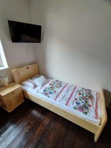 A bed or beds in a room at Gazdov dvor