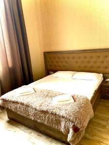 Postel nebo postele na pokoji v ubytování Glendale Boutique Hotel