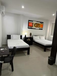 Cama o camas de una habitación en Hotel River Side