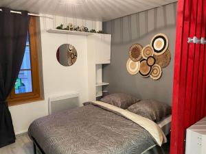 Posteľ alebo postele v izbe v ubytovaní Appart hôtel Toucy 2