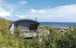 エーベルトフトにあるStunning Home In Ebeltoft With 4 Bedrooms, Sauna And Wifiの円形の建物