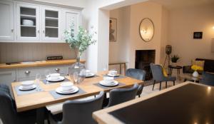 a kitchen and dining room with a table and chairs at 35 Grosvenor Terrace - 5 min walk from York City Centre in York