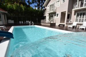 A piscina localizada em Doce Canela - Pousada de Charme ou nos arredores