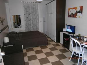 TV a/nebo společenská místnost v ubytování Casa Vacanza Nina