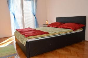 Posteľ alebo postele v izbe v ubytovaní Apartments Sunshine & Smile