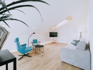 TV a/nebo společenská místnost v ubytování Gourmet - Boutique Hotel Tanzer