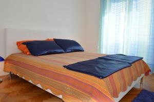Posteľ alebo postele v izbe v ubytovaní Apartments Sunshine & Smile