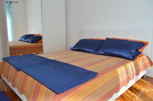 Posteľ alebo postele v izbe v ubytovaní Apartments Sunshine & Smile