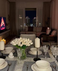 Getränke in der Unterkunft Beachfront Luxury Apartment-Pearl Island شقه مطله على الشاطئ بجزيرة اللؤلؤه