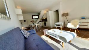 TV a/nebo společenská místnost v ubytování Sole del Lago