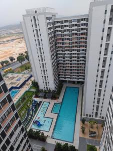 Φωτογραφία από το άλμπουμ του Swiss Home Horizon Suite 1 σε Σεπάνγκ
