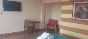 Μια τηλεόραση ή/και κέντρο ψυχαγωγίας στο Beliz Inn