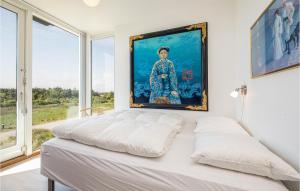 Postel nebo postele na pokoji v ubytování Holiday Home Strandklit Iii