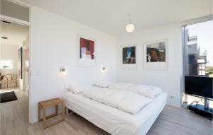 Postel nebo postele na pokoji v ubytování Holiday Home Strandklit Iii