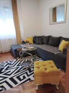 Posezení v ubytování APARTMAN SUNFLOWER