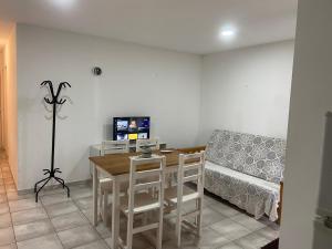 TV a/nebo společenská místnost v ubytování Súpercomodo + 3 fotografie