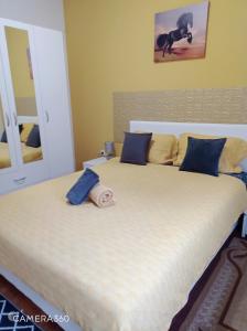 Postel nebo postele na pokoji v ubytování APARTMAN SUNFLOWER