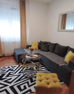 Posezení v ubytování APARTMAN SUNFLOWER