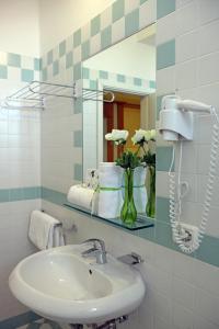 Koupelna v ubytování Hotel Bel Air