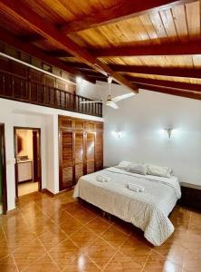 a bedroom with a large bed in a room at Moreno House in Corrientes