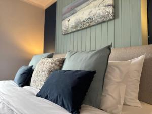 Кровать или кровати в номере Number 2 Seafield - sleeps 5 - Grantham town
