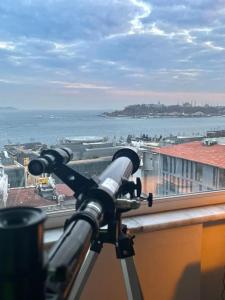 a view of the ocean from a telescope at House of Design *Hagia Sophia View* in Istanbul