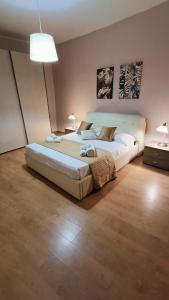 Postel nebo postele na pokoji v ubytování La Terrazza Di Athena sweet rooms
