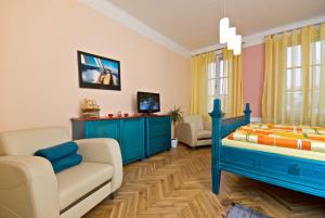 TV a/nebo společenská místnost v ubytování Pension Ibérica
