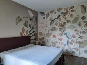 Postel nebo postele na pokoji v ubytování Le Maddalene B&B