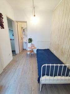 Postel nebo postele na pokoji v ubytování Small lovely studio