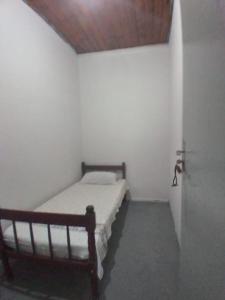 Giường trong phòng chung tại Hostel Gomes