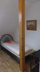 a bedroom with a bunk bed in a room at Pension Úsvit in Podkopná Lhota